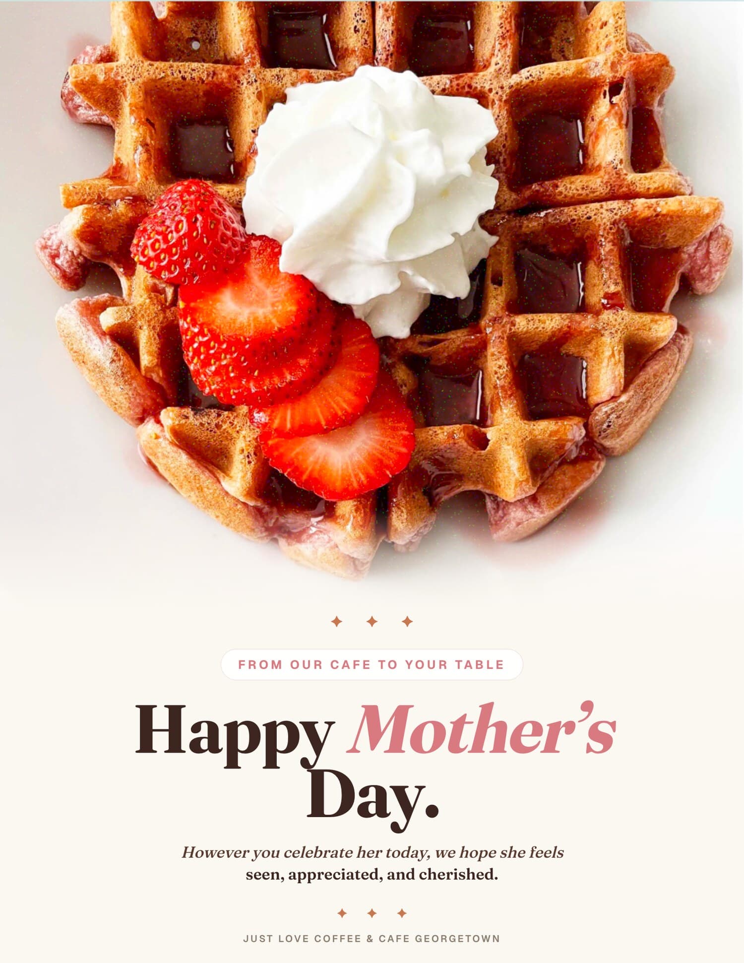 Happy Mother's Day display from Just Love Coffee & Cafe Georgetown — strawberries and cream waffle with whipped cream on a white plate