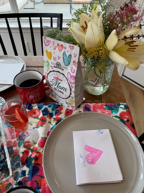 Mother's Day Reserve Roast coffee bag with the Just Love mug ready on the counter